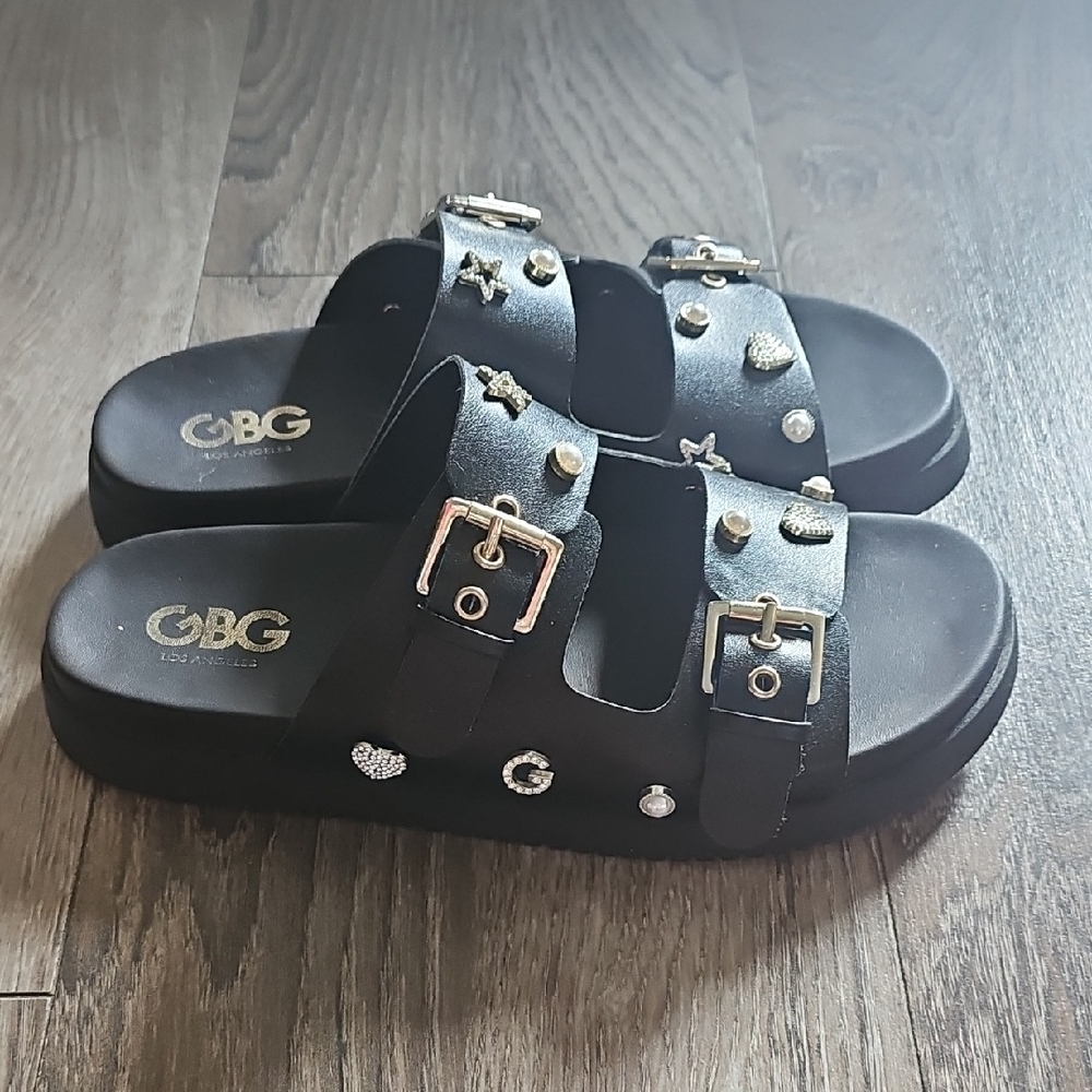 GBG Los Angeles Black Sandals with Gold Accents